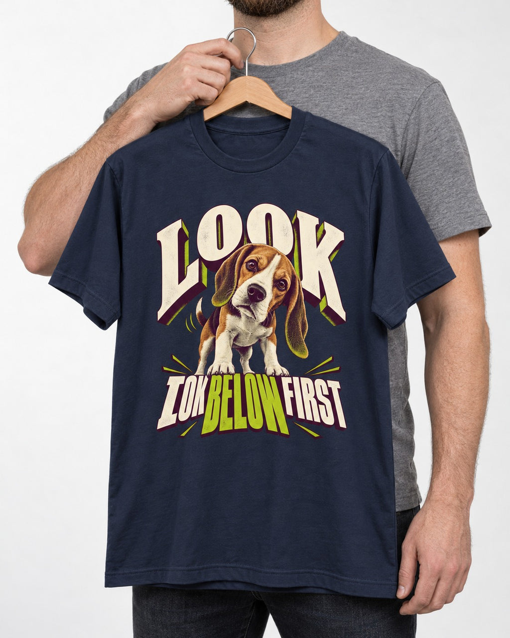 Beagle Look Low Below First T-Shirt in Navy, held up on a hanger