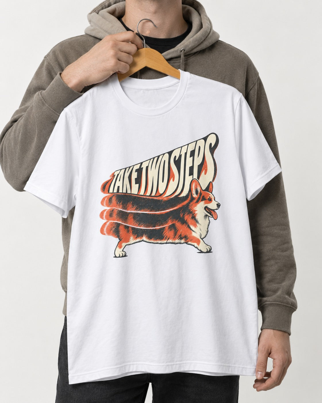 Corgi Take Two Steps Motion Trail Graphic T-Shirt in White, held up on a hanger