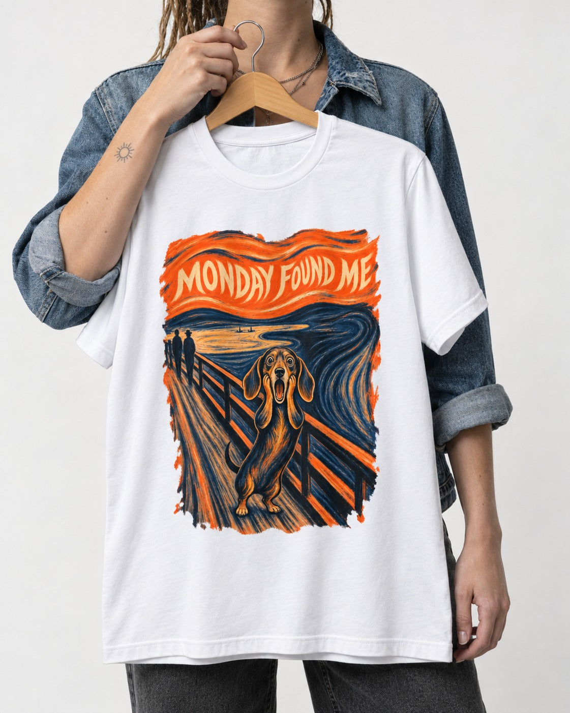 Dachshund Monday Found Me Scream Poster T-Shirt in White, held up on a hanger