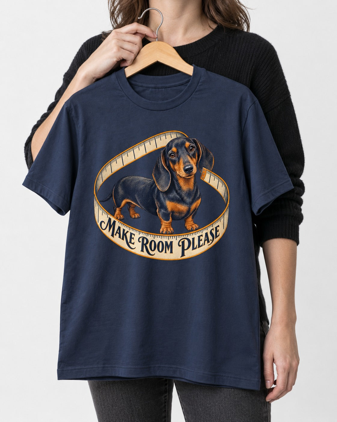 Dachshund Make Room Please Measuring Tape Graphic T-Shirt in Navy, held up on a hanger