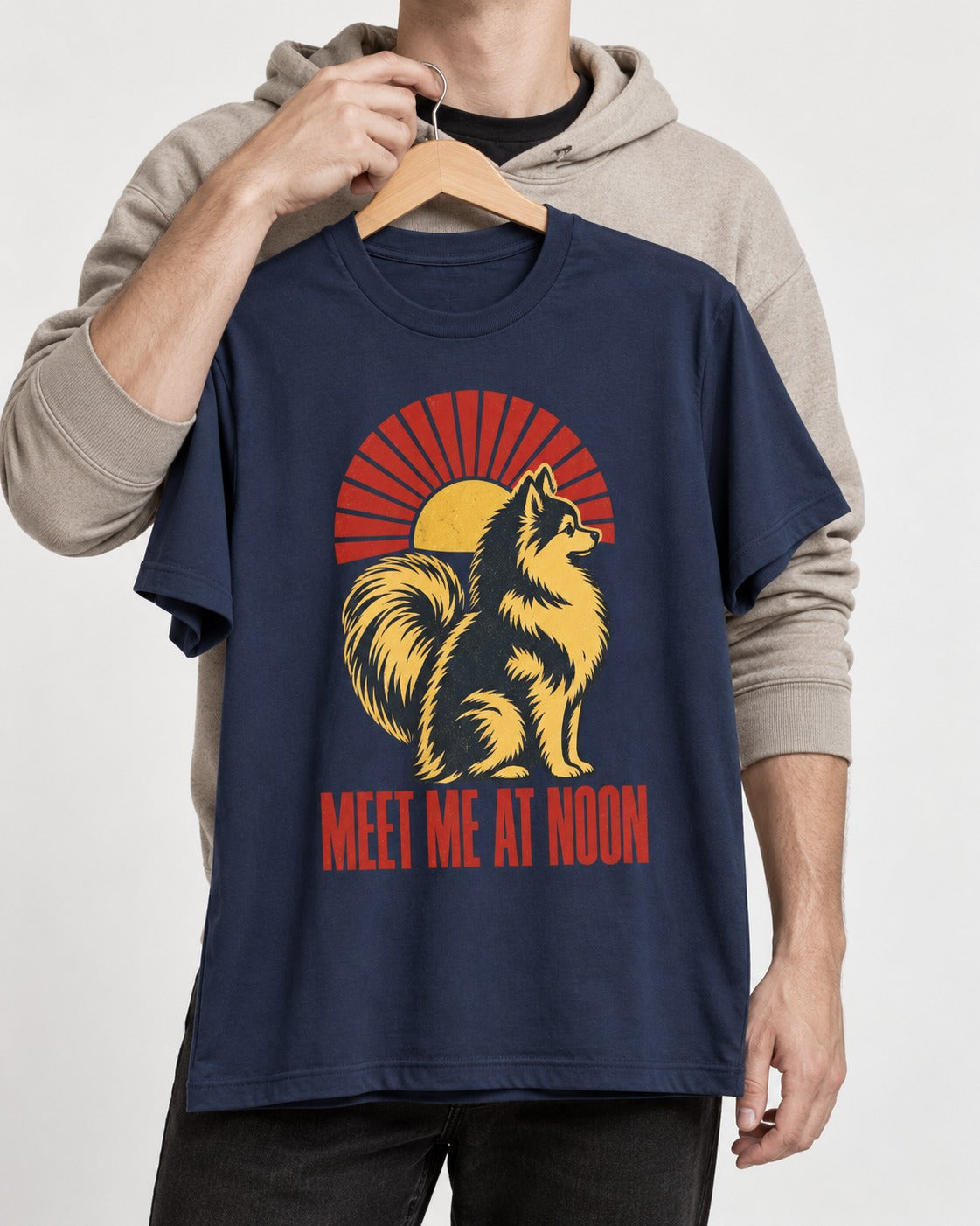 Pomeranian Meet Me at Noon Sunburst Graphic T-Shirt in Navy, held up on a hanger