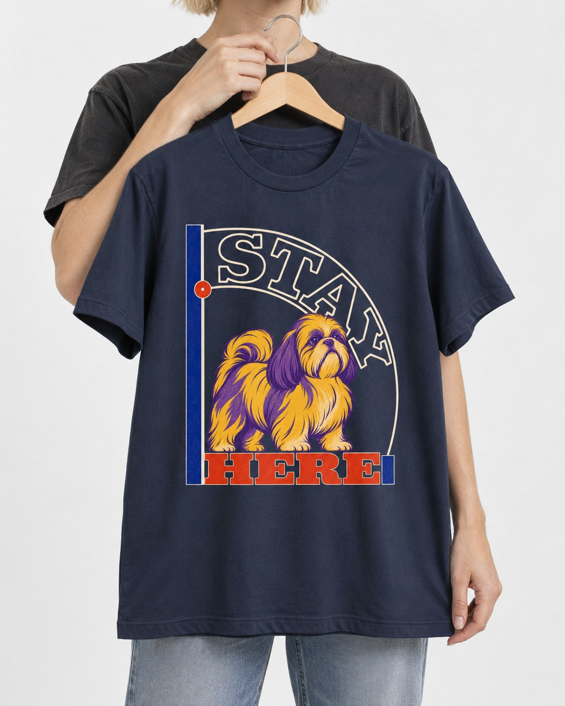 Shih Tzu Stay Here Semicircle Sign Graphic T-Shirt in Navy, held up on a hanger
