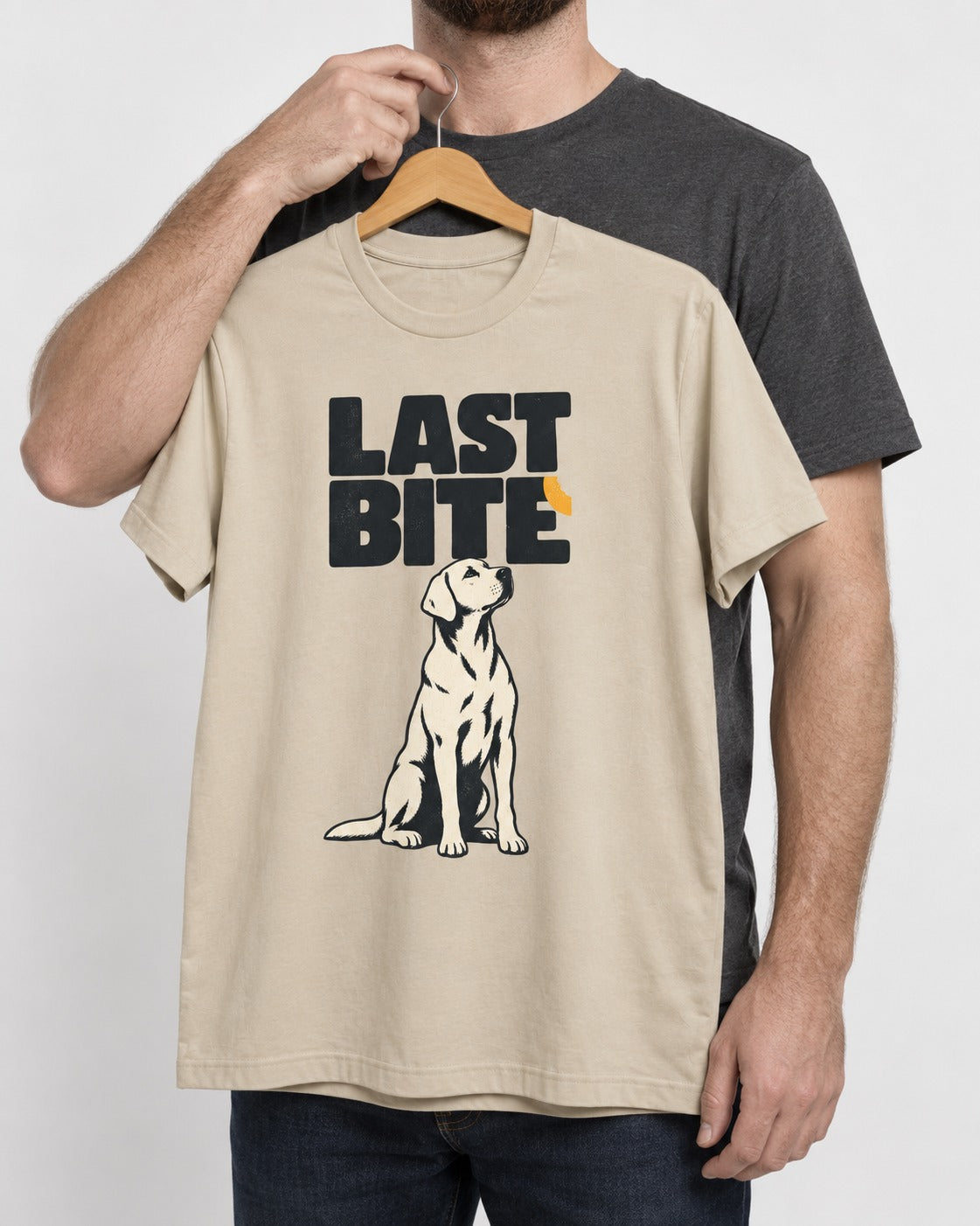 Labrador Retriever's Last Bite T-Shirt in Sand, held up on a hanger