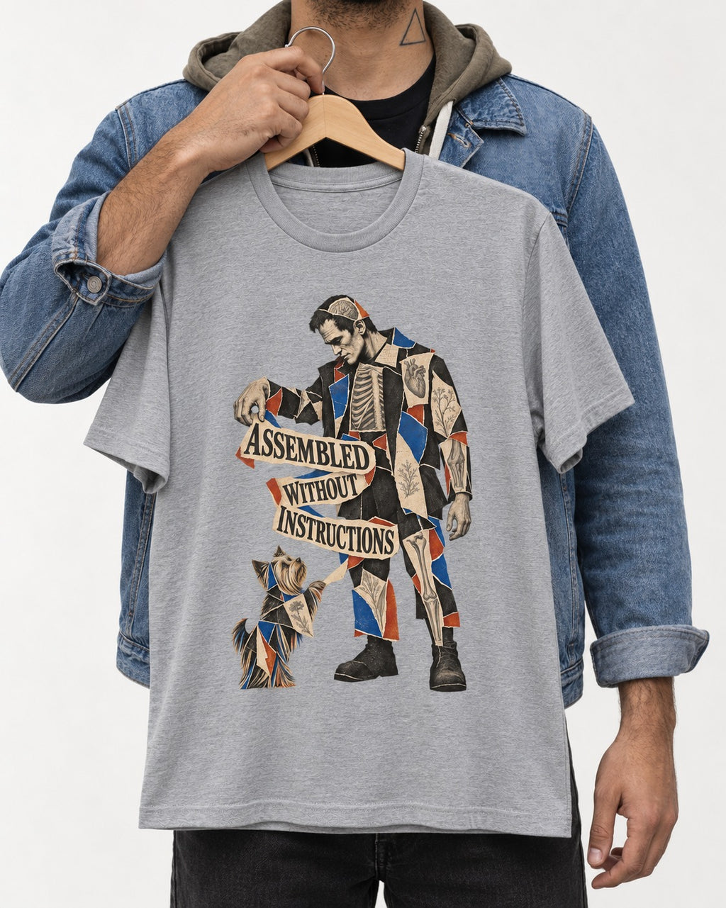 Yorkshire Terrier Assembled Without Instructions T-Shirt in Sport Grey, held up on a hanger