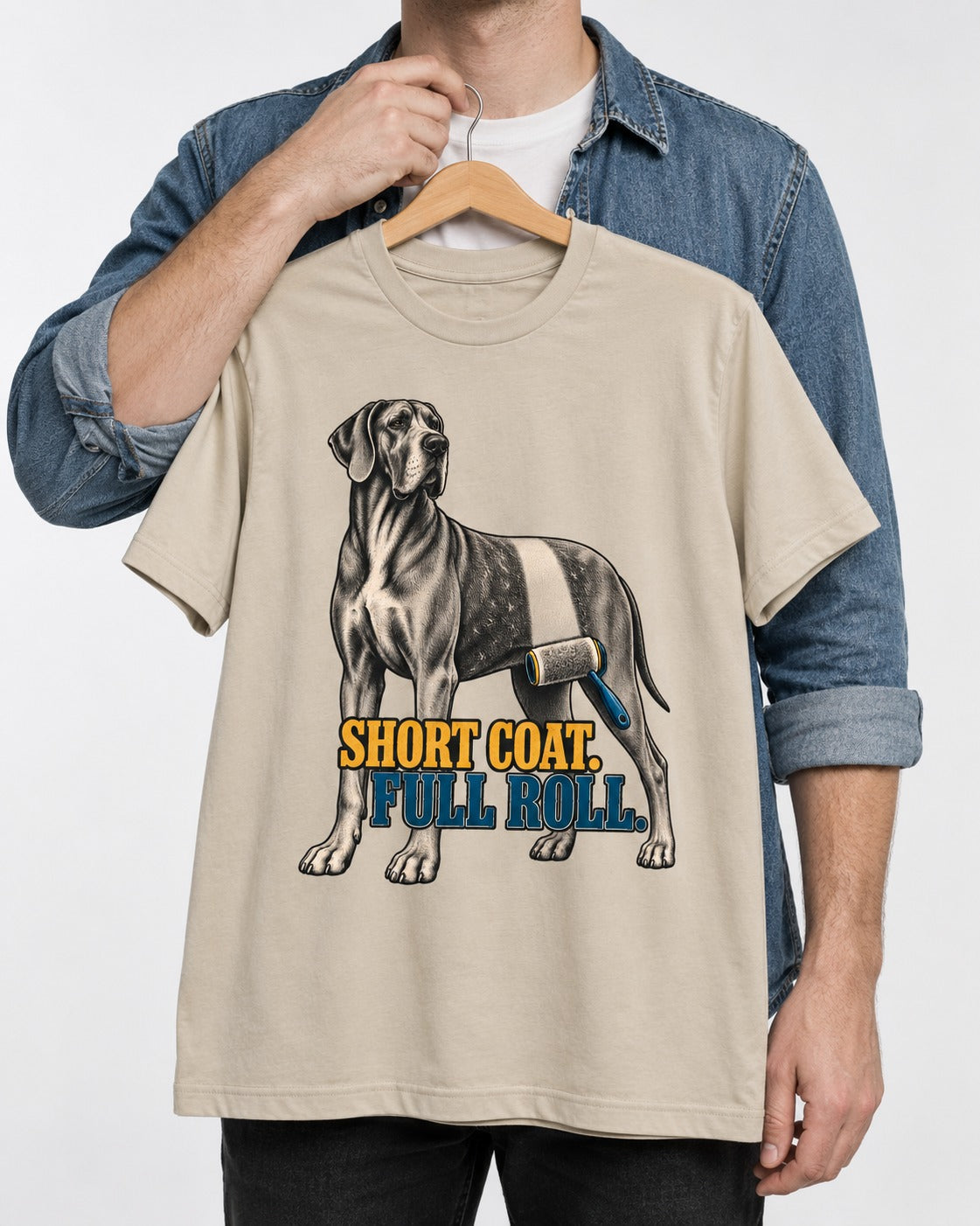 Short Coat Full Roll Great Dane T-Shirt in Sand, held up on a hanger