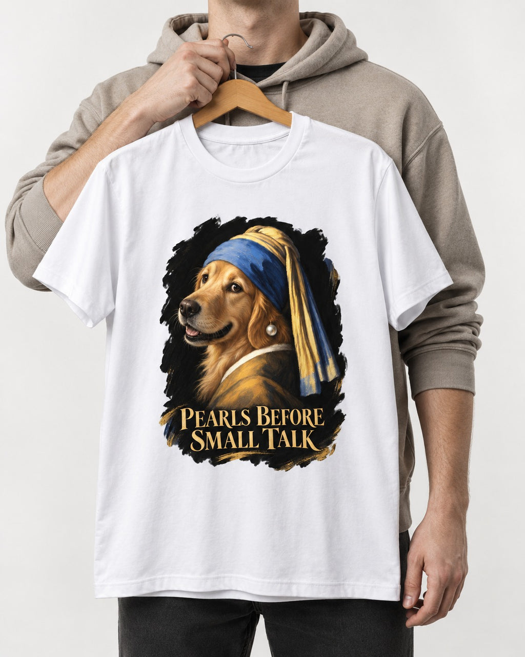 Pearls Before Small Talk Pearl Portrait Golden Retriever Graphic T-Shirt in White, held up on a hanger