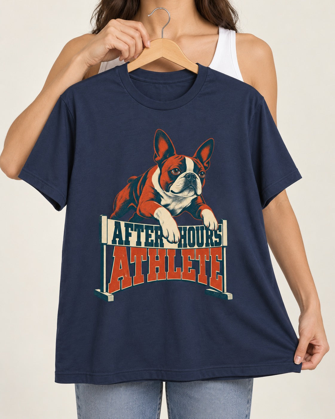 After Hours Athlete Boston Terrier T-Shirt in Navy, held up on a hanger