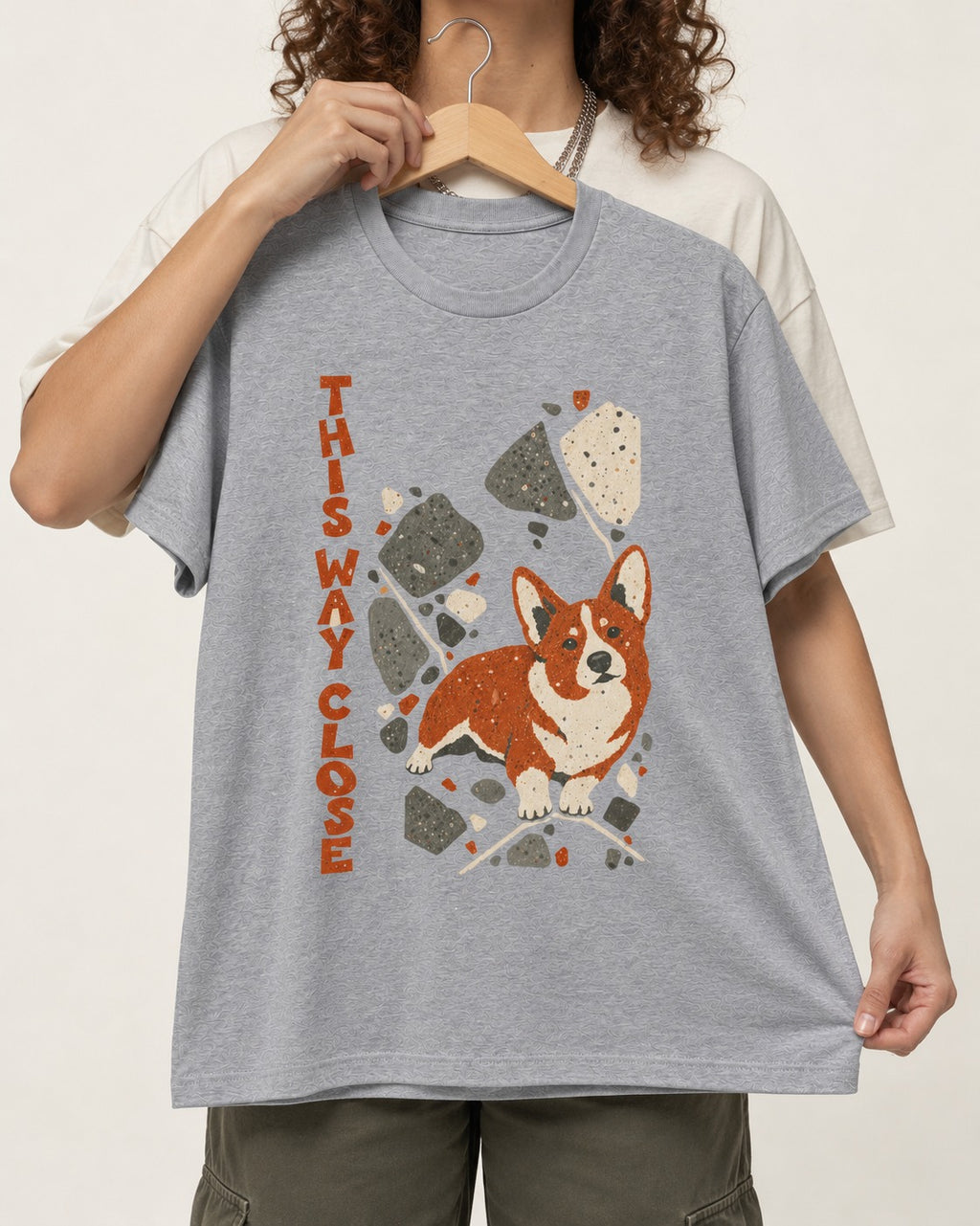 Corgi This Way Close Rubble Graphic T-Shirt in Sport Grey, held up on a hanger