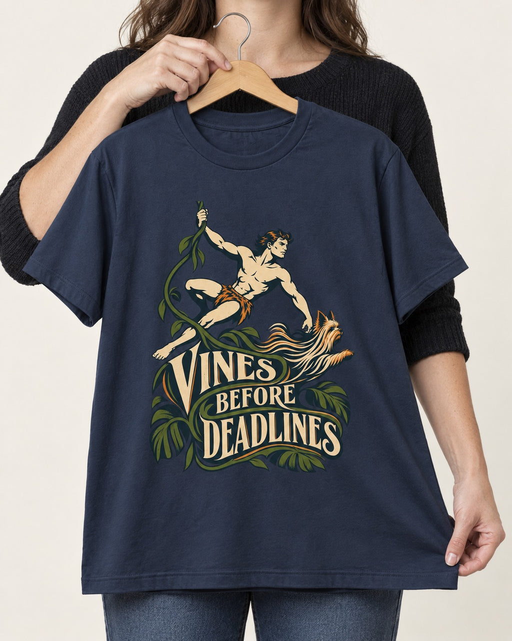 Yorkshire Terrier Vines Before Deadlines Jungle Hero Graphic T-Shirt in Navy, held up on a hanger