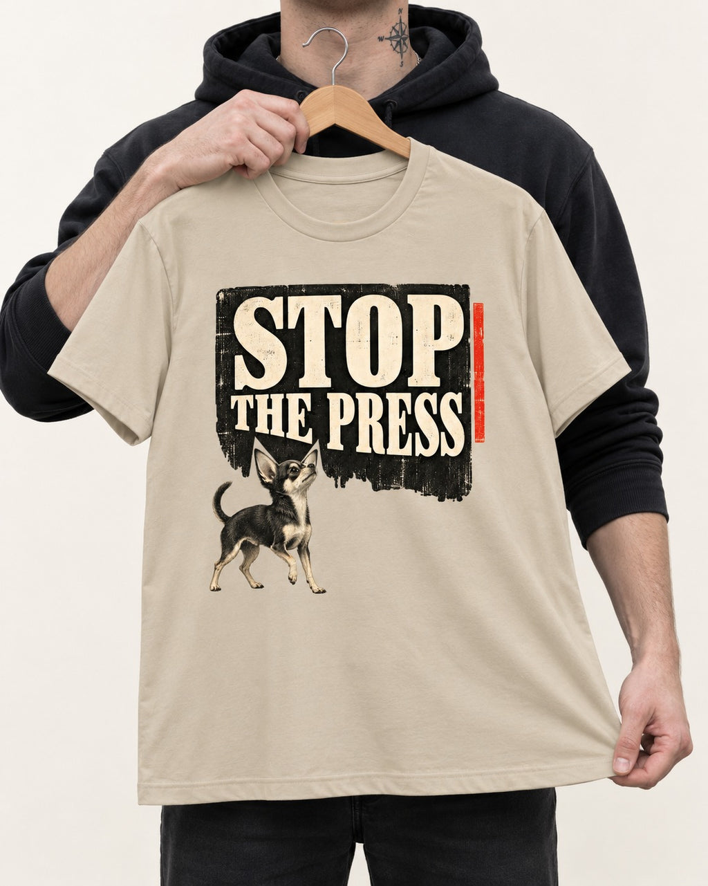 Stop the Press Chihuahua T-Shirt in Sand, held up on a hanger
