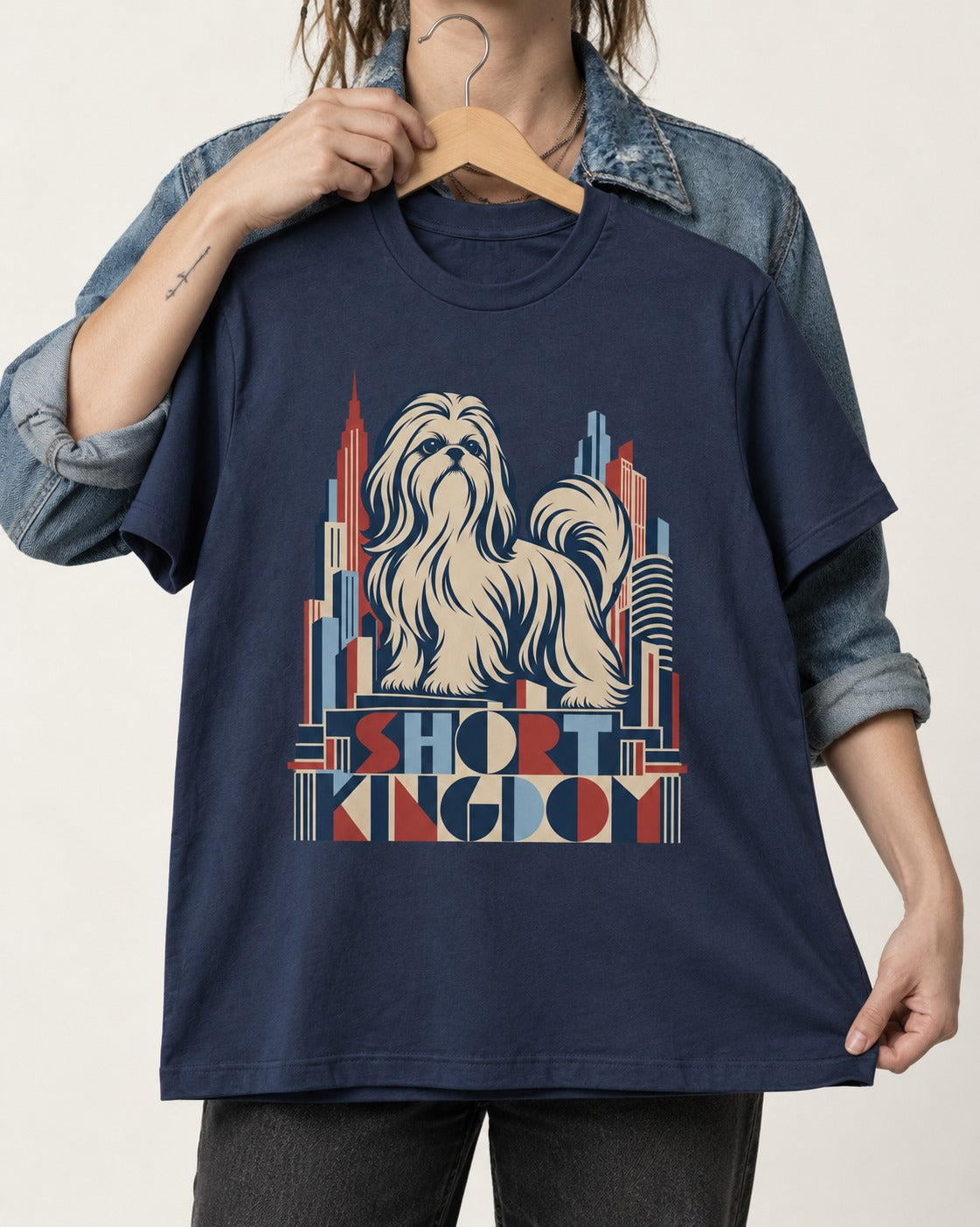 Shih Tzu Short Kingdom Art Deco Skyline Graphic T-Shirt in Navy, held up on a hanger
