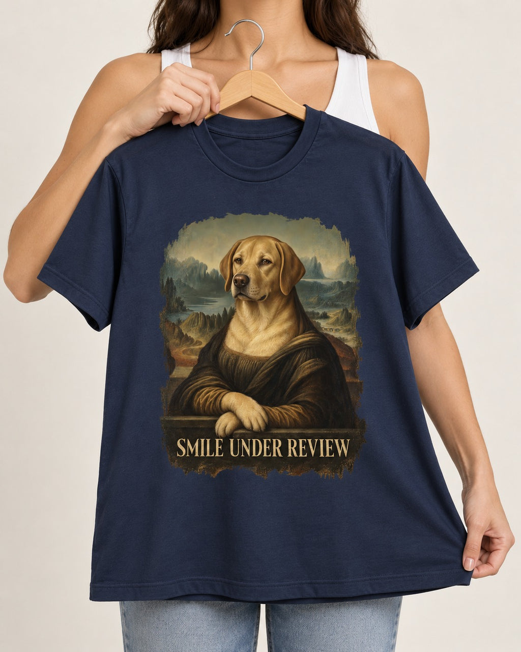 Labrador Retriever Smile Under Review Mona Lisa Graphic T-Shirt in Navy, held up on a hanger