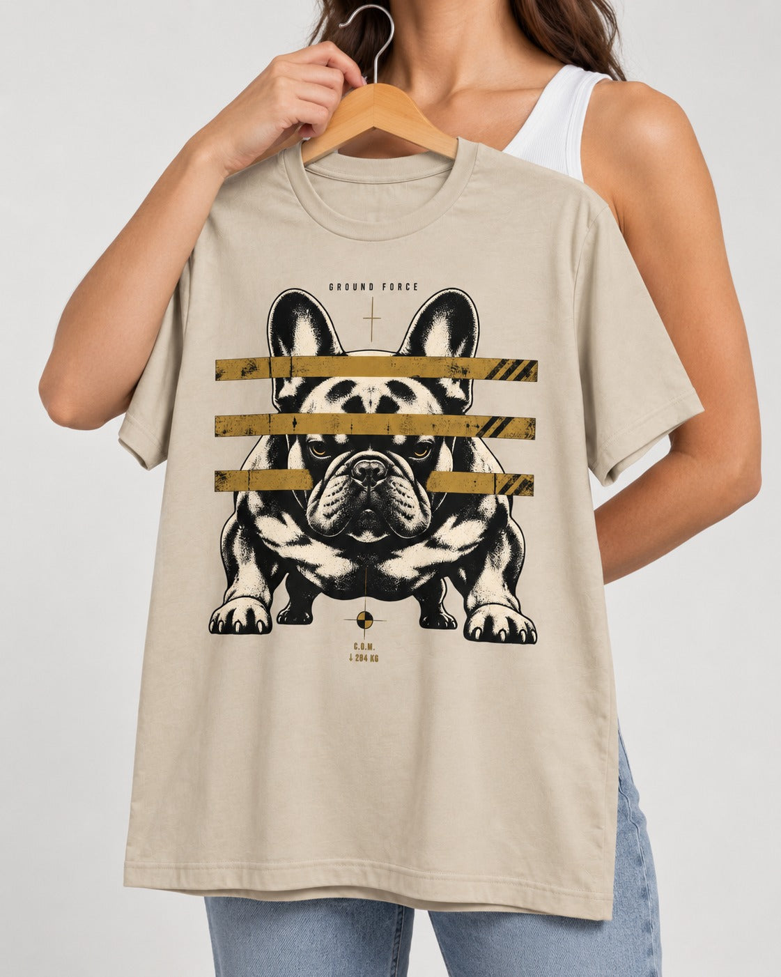 Frenchie Ground Force Industrial Barrier Graphic T-Shirt in Sand, held up on a hanger