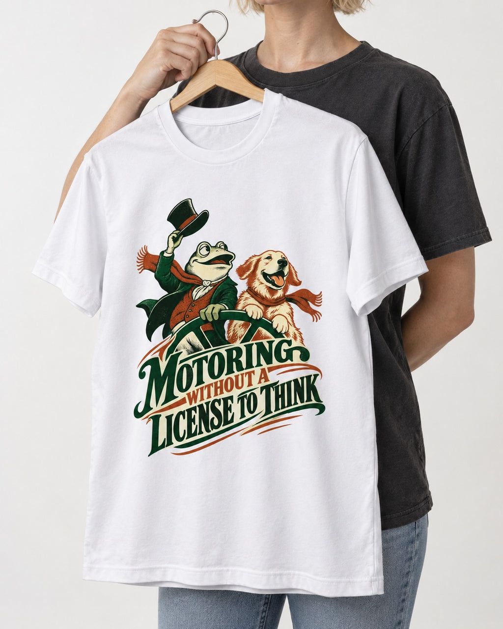 Golden Retriever Motoring Without a License to Think Driving Graphic T-Shirt in White, held up on a hanger