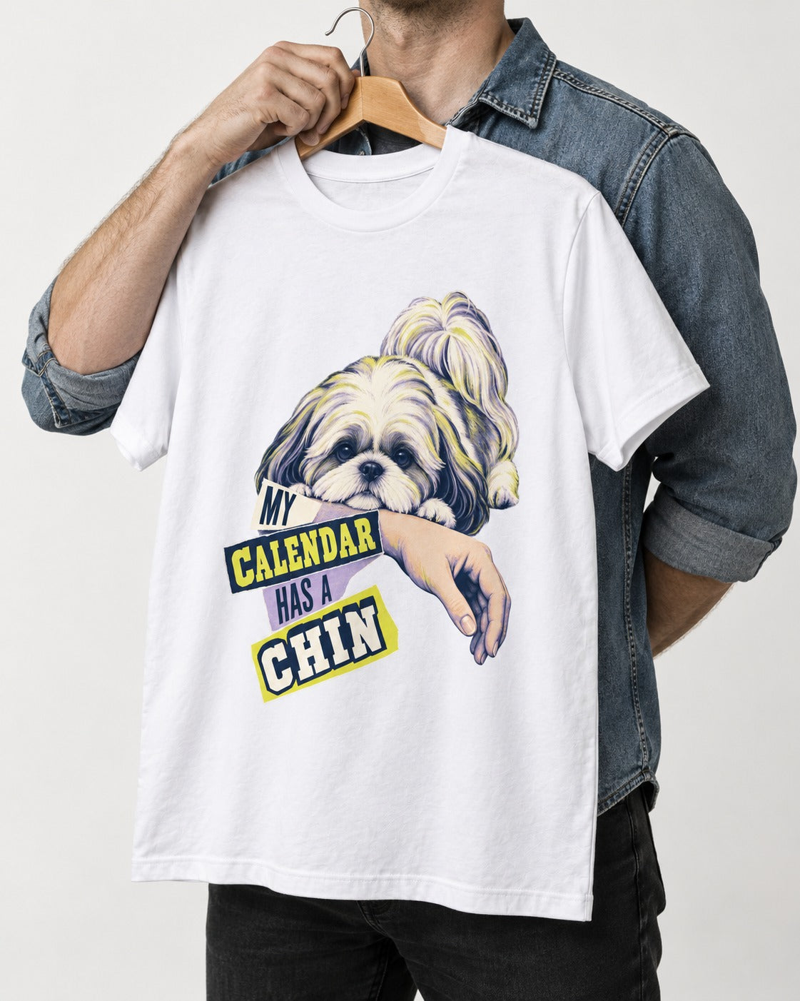 Shih Tzu My Calendar Has a Chin Arm Rest Graphic T-Shirt in White, held up on a hanger