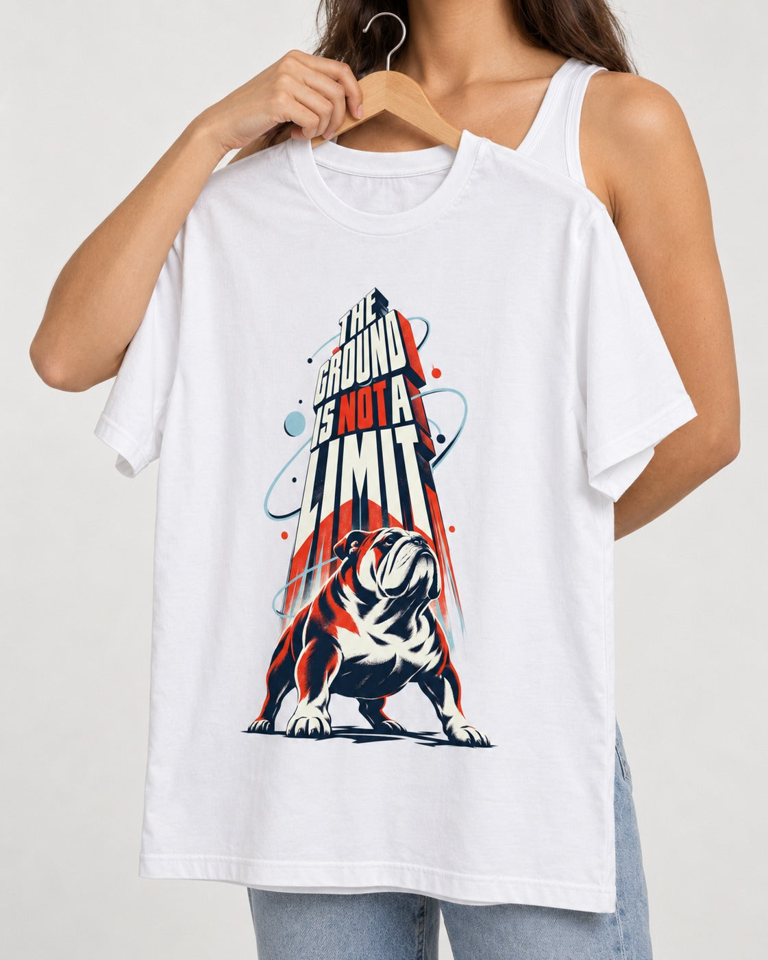 English Bulldog The Ground Is Not a Limit Orbital Graphic T-Shirt in White, held up on a hanger