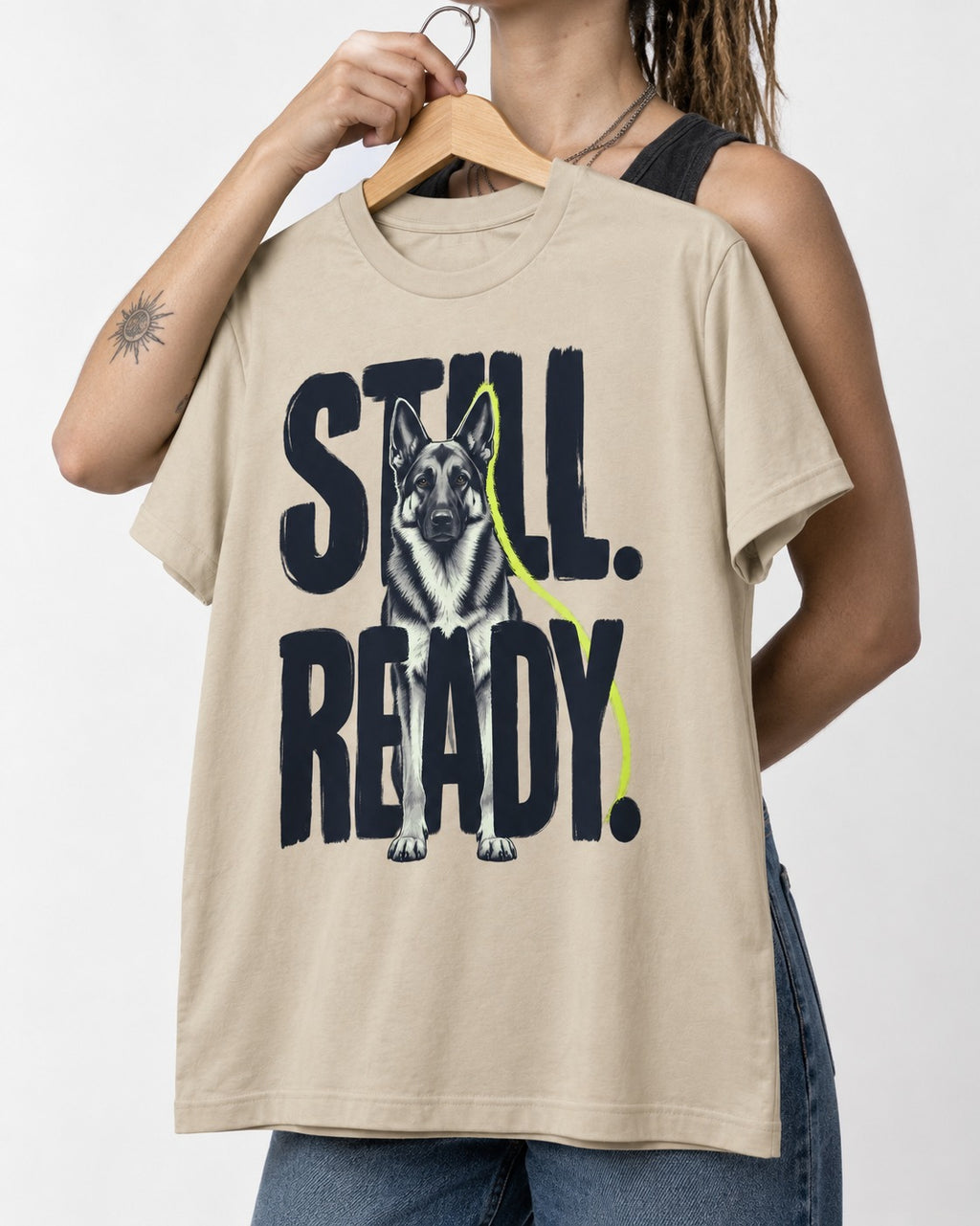 Still Ready German Shepherd Dog T-Shirt in Sand, held up on a hanger