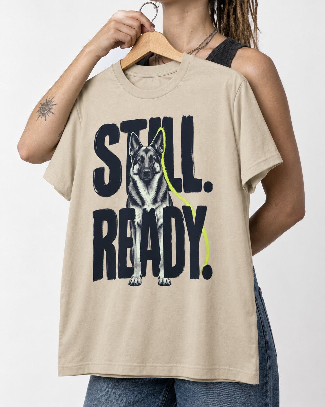 Still Ready German Shepherd Dog T-Shirt in Sand, held up on a hanger