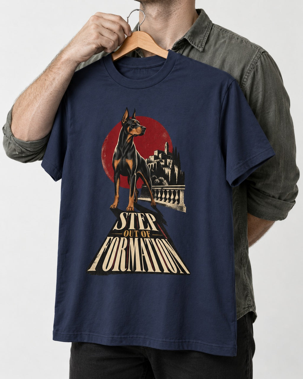 Doberman Step Out of Formation Road Vista Graphic T-Shirt in Navy, held up on a hanger