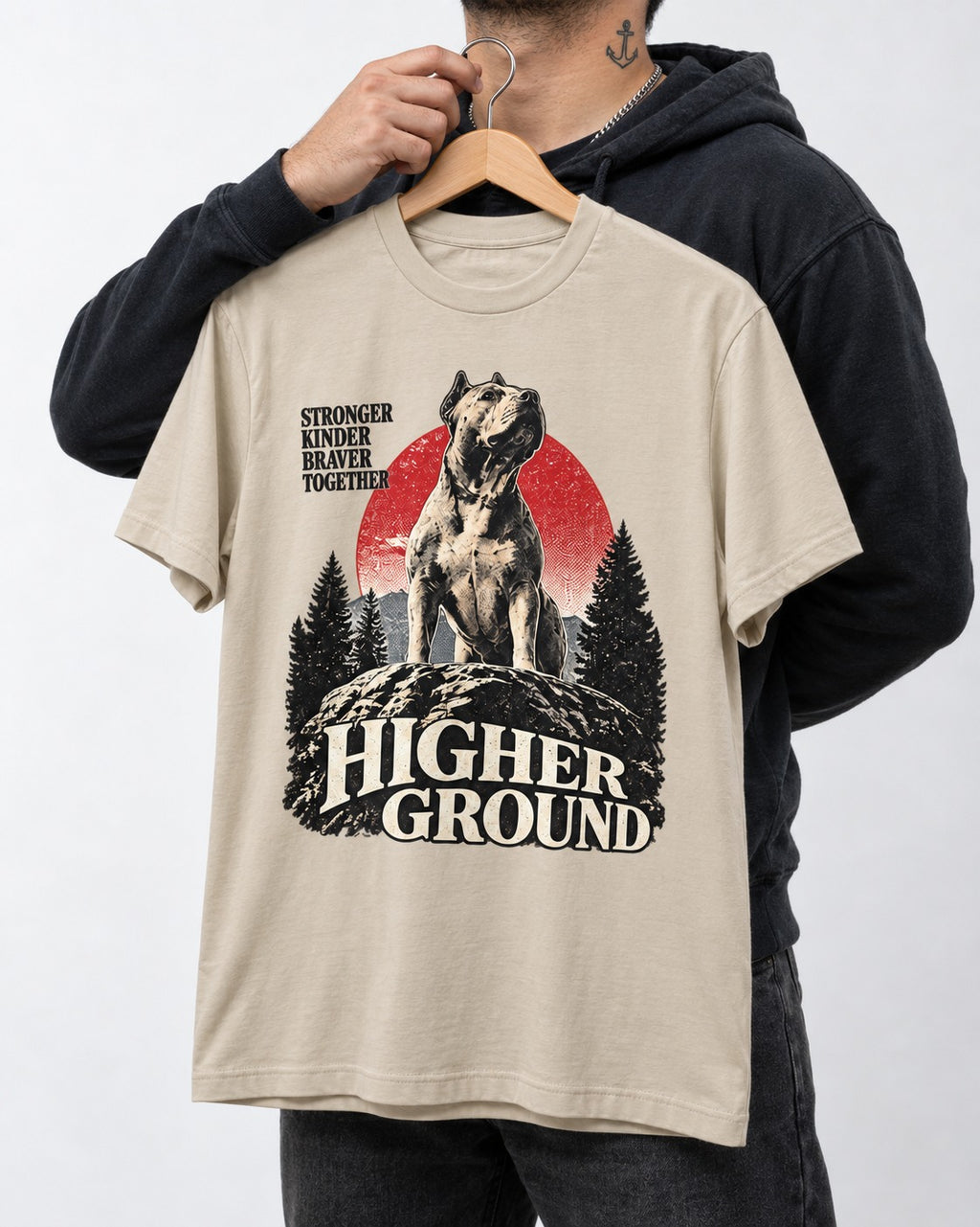 Pitbull Higher Ground T-Shirt in Sand, held up on a hanger