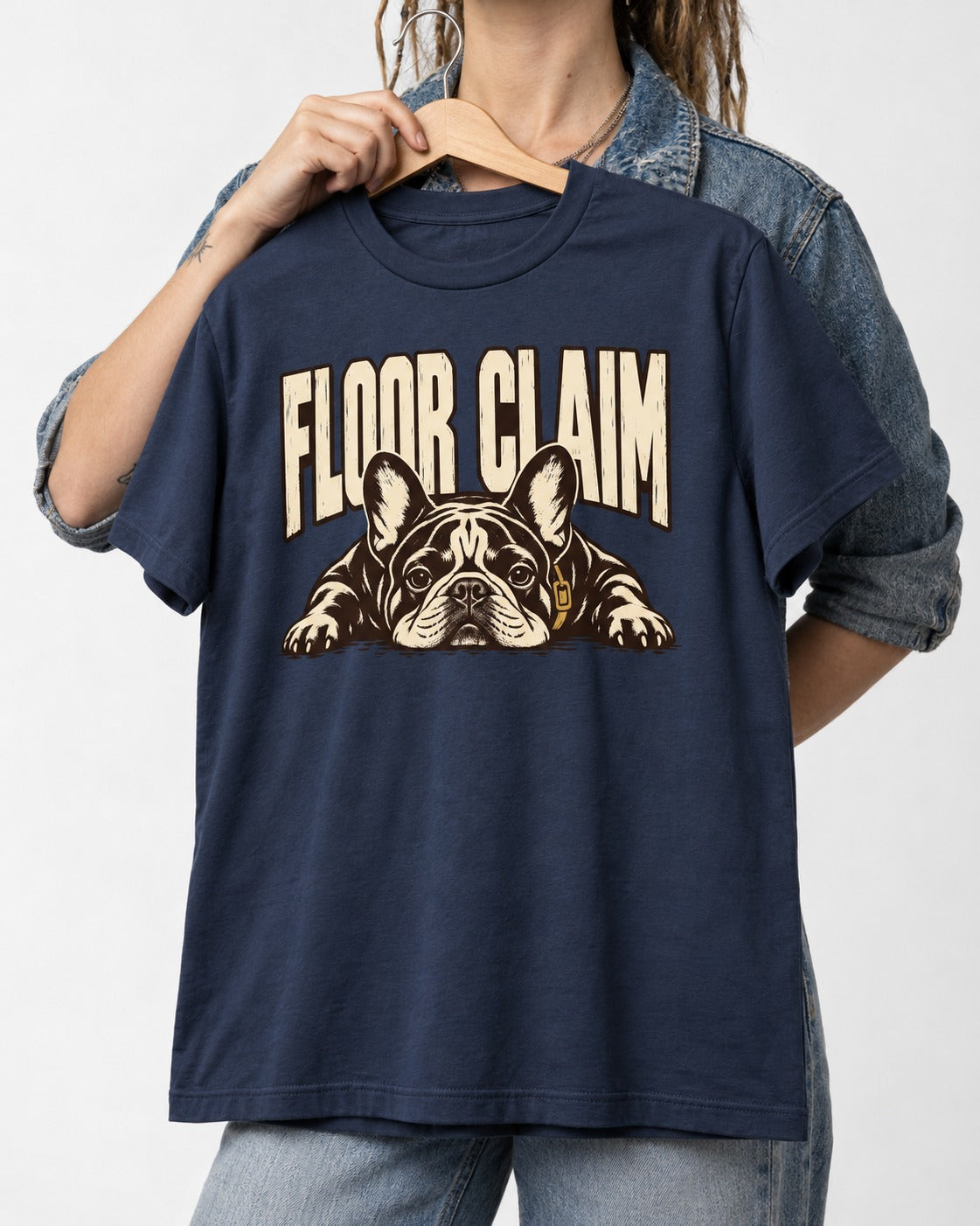 Frenchie Floor Claim Resting Graphic T-Shirt in Navy, held up on a hanger