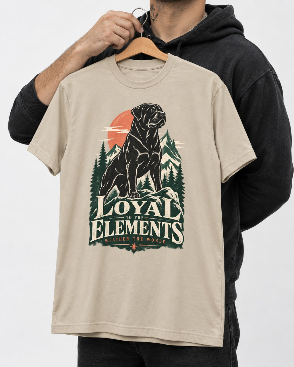 Rottweiler Loyal to the Elements T-Shirt in Sand, held up on a hanger