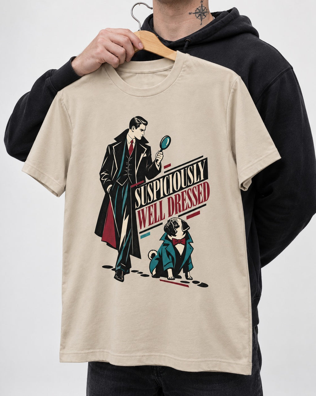 Suspiciously Well Dressed Pug T-Shirt in Sand, held up on a hanger