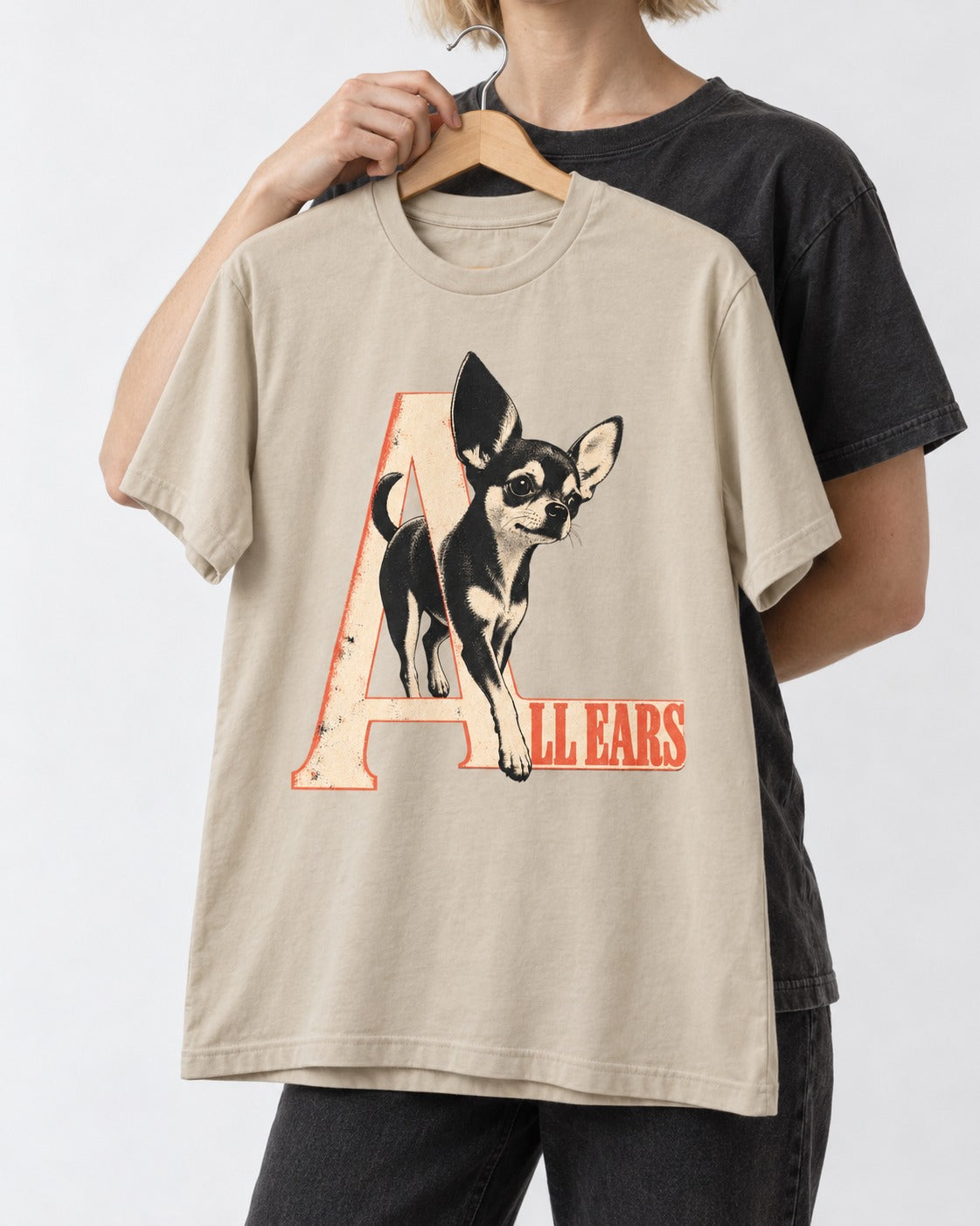 All Ears Chihuahua T-Shirt in Sand, held up on a hanger