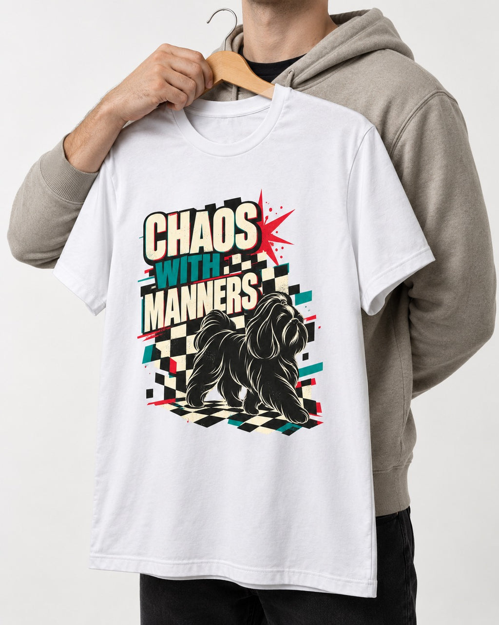 Shih Tzu Chaos with Manners Checkerboard Graphic T-Shirt in White, held up on a hanger
