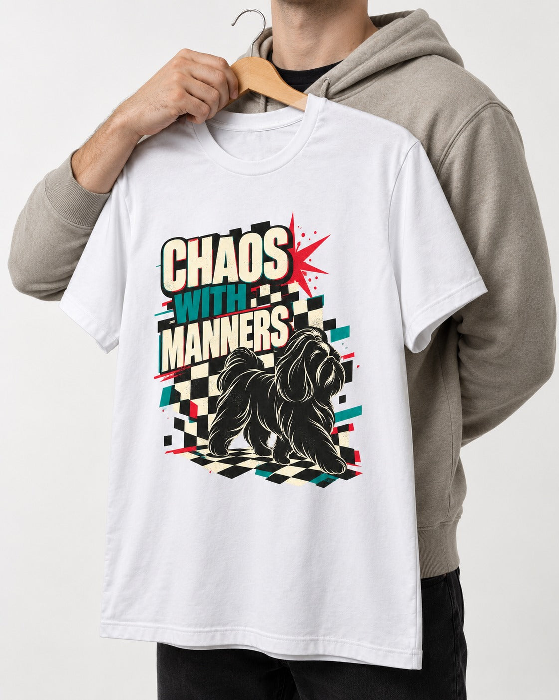Shih Tzu Chaos with Manners Checkerboard Graphic T-Shirt in White, held up on a hanger