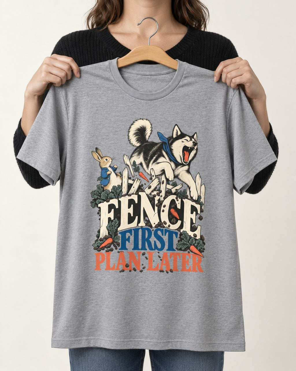 Husky Fence First Plan Later Garden Escape Graphic T-Shirt in Sport Grey, held up on a hanger