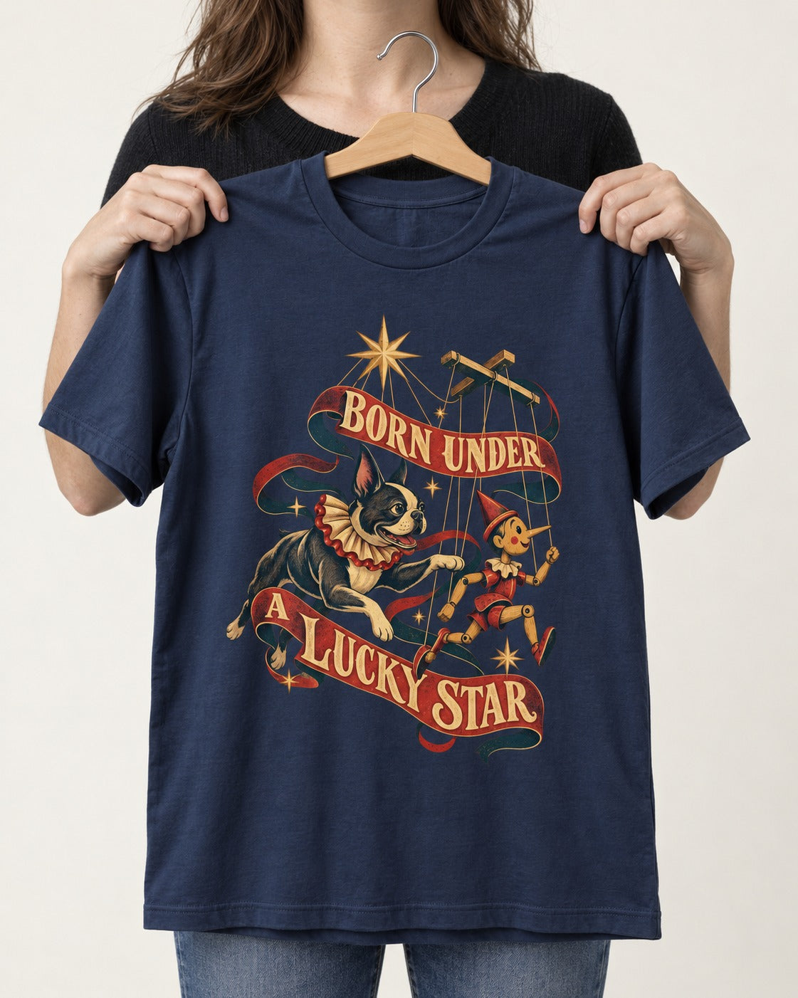 Born Under a Lucky Star Boston Terrier T-Shirt in Navy, held up on a hanger