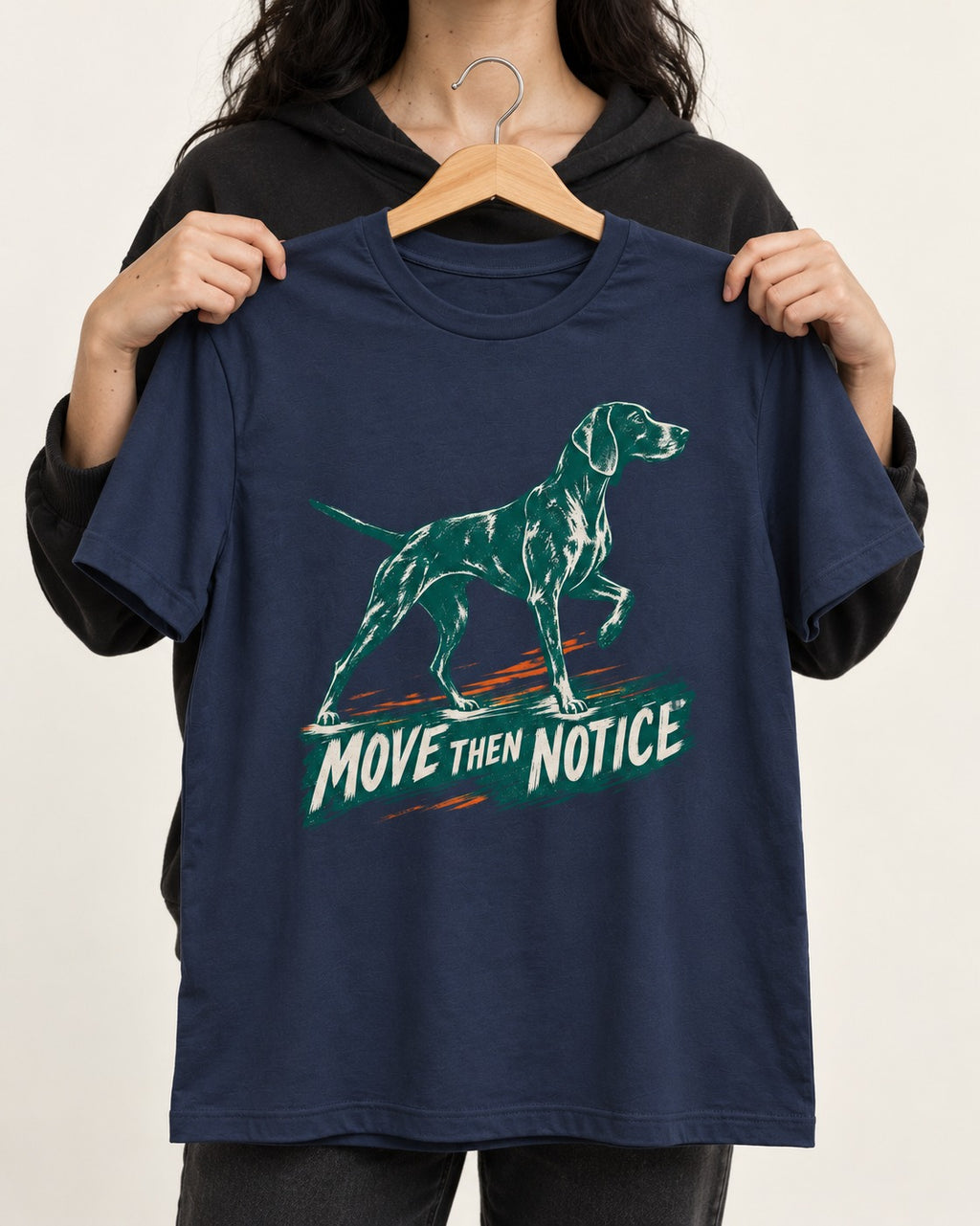 German Shorthaired Pointer Move Then Notice Brushstroke Graphic T-Shirt in Navy, held up on a hanger