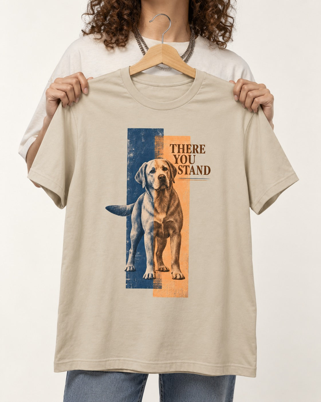 There You Stand Labrador Retriever T-Shirt in Sand, held up on a hanger