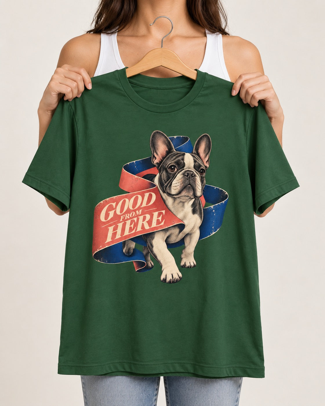Frenchie Good From Here Ribbon Graphic T-Shirt in Forest Green, held up on a hanger