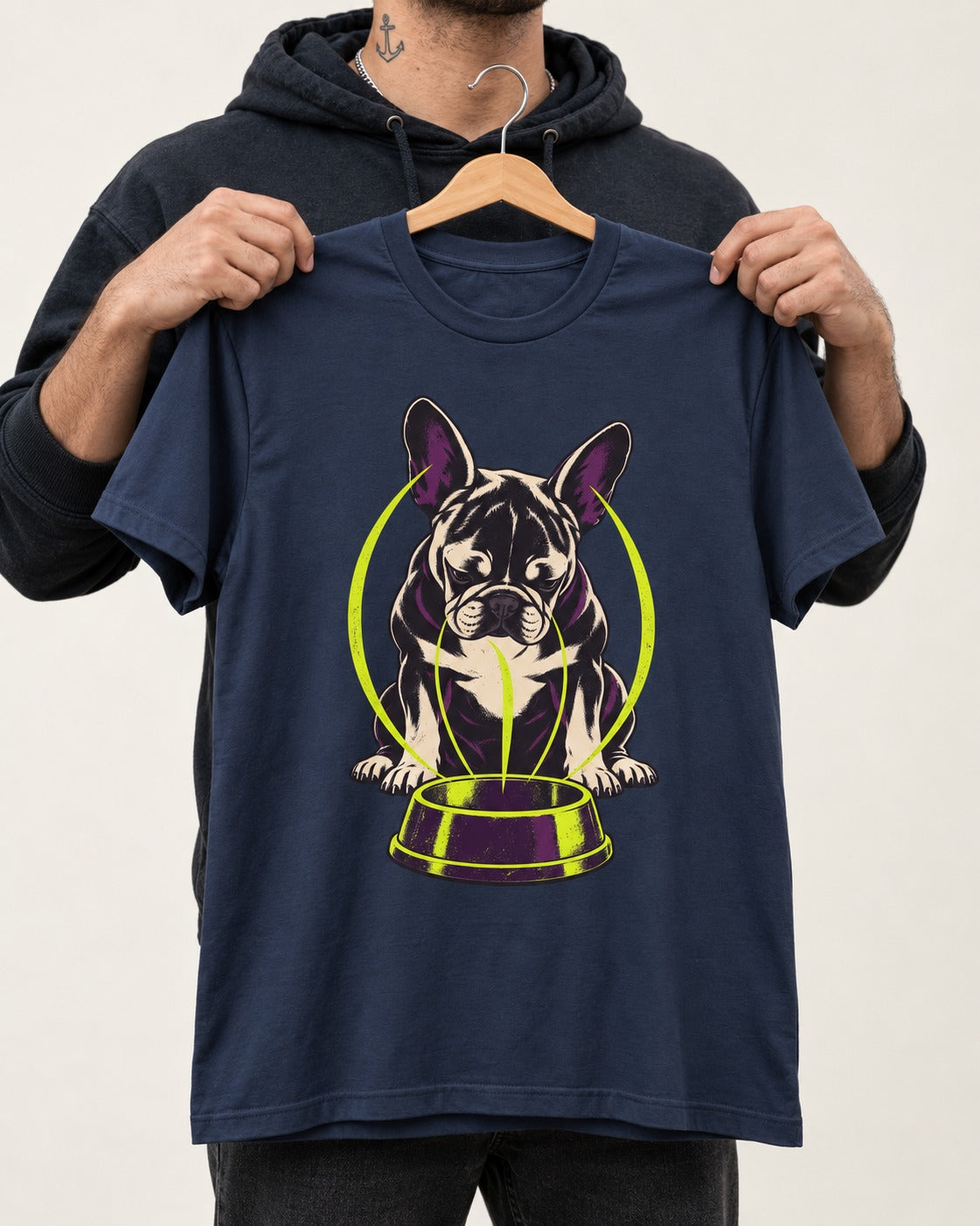 Frenchie Bowl Gravity Graphic T-Shirt in Navy, held up on a hanger