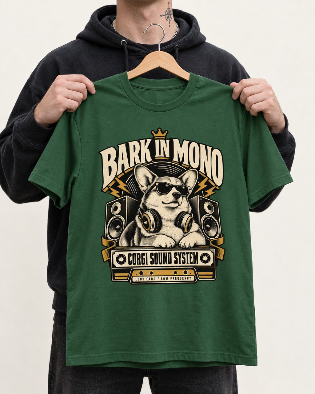 Corgi Bark in Mono Sound System T-Shirt in Forest Green, held up on a hanger