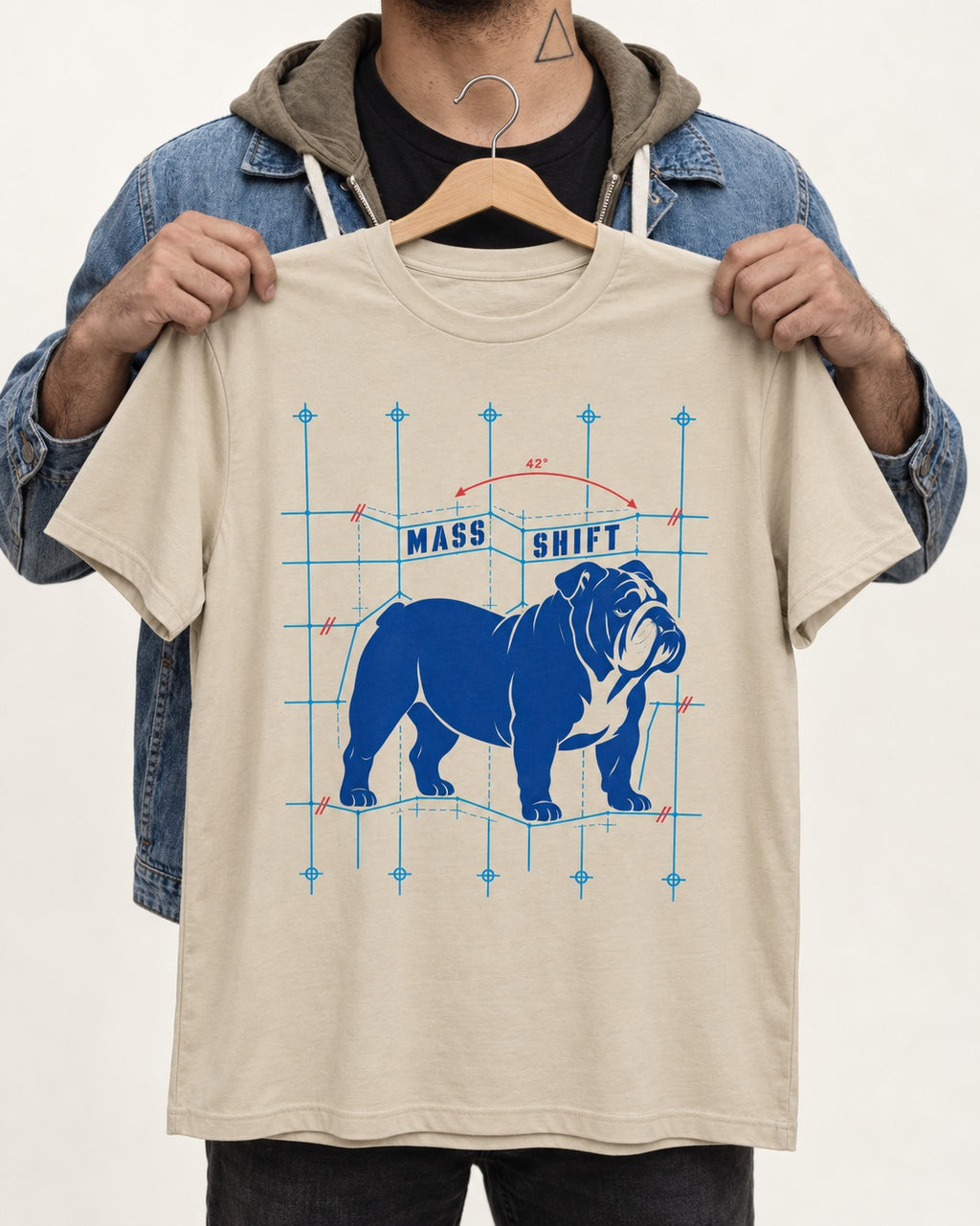 Mass Shift English Bulldog T-Shirt in Sand, held up on a hanger