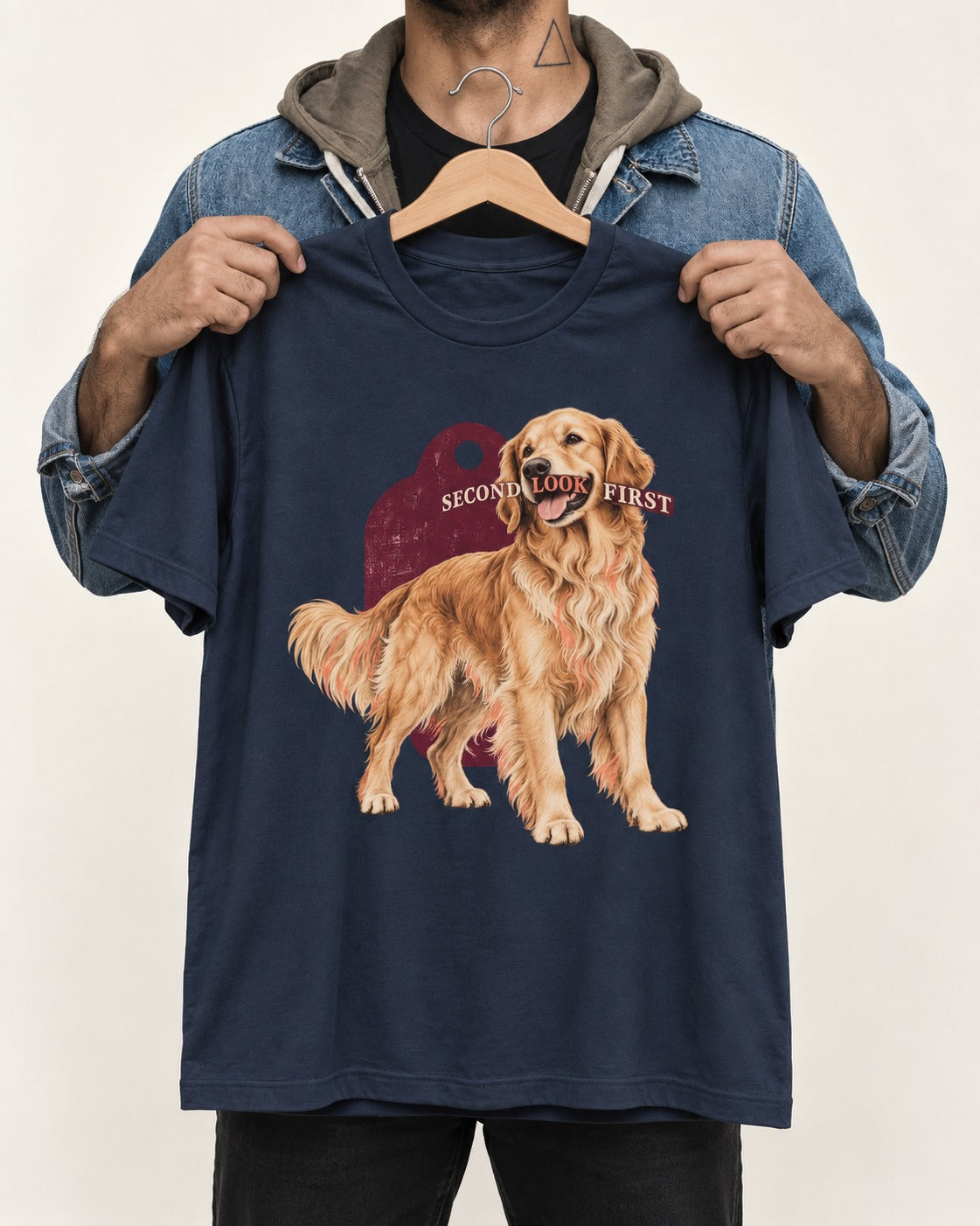 Golden Retriever Second Look First Tag Portrait Graphic T-Shirt in Navy, held up on a hanger