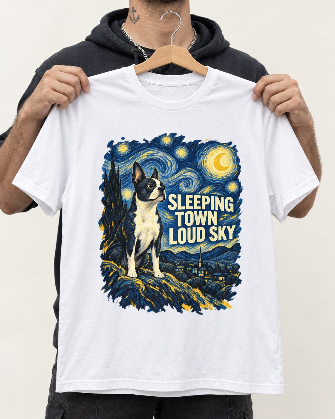 Sleeping Town Loud Sky Boston Terrier Starry Night T-Shirt in White, held up on a hanger
