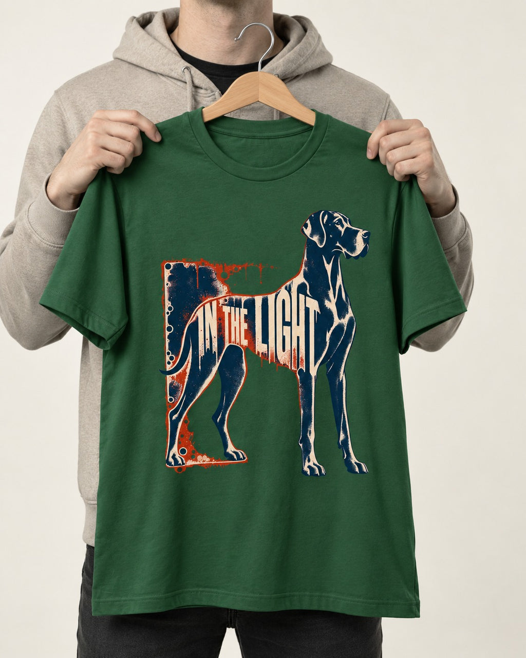 Great Dane In the Light Industrial Frame Graphic T-Shirt in Forest Green, held up on a hanger
