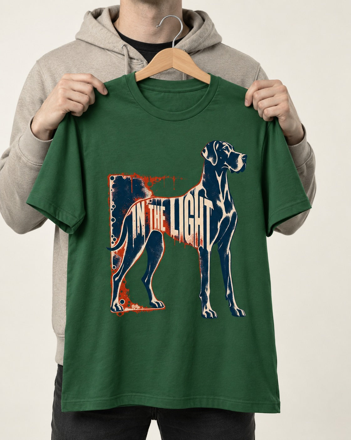 Great Dane In the Light Industrial Frame Graphic T-Shirt in Forest Green, held up on a hanger