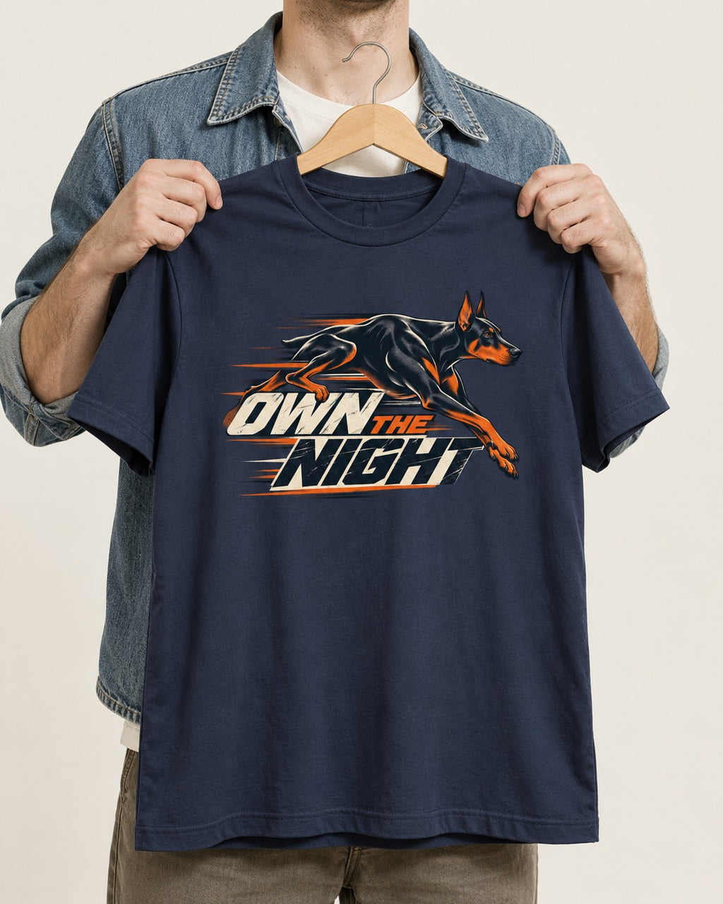 Doberman Own the Night Speed Graphic T-Shirt in Navy, held up on a hanger