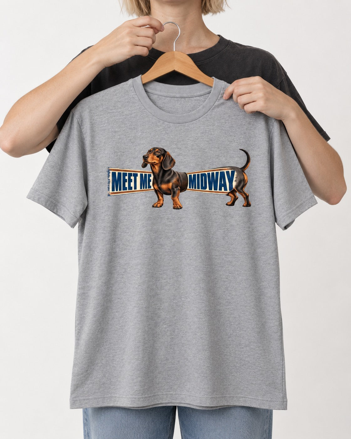 Dachshund Meet Me Midway T-Shirt in Sport Grey, held up on a hanger