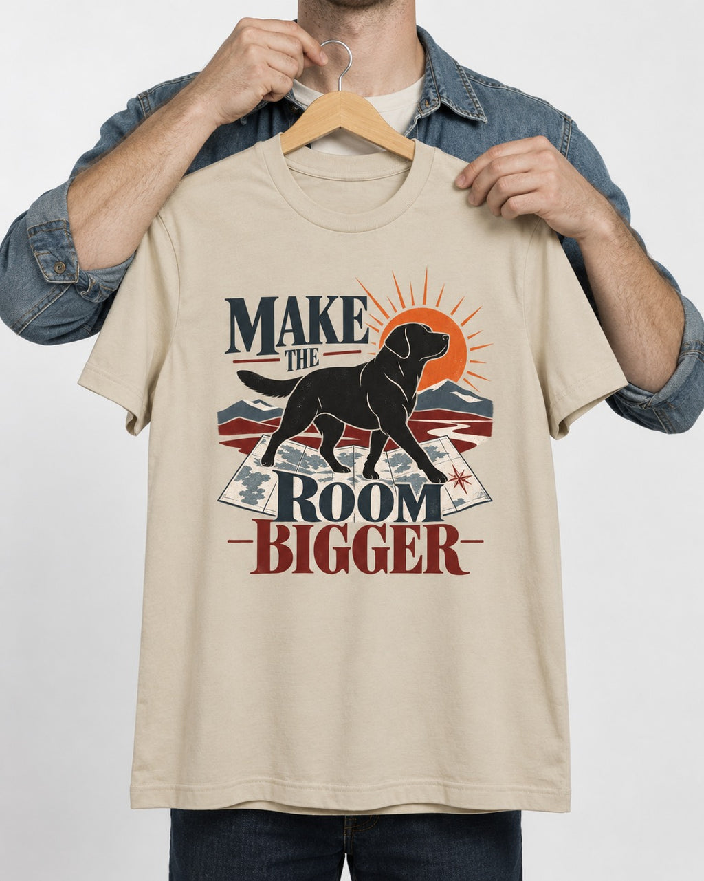 Make the Room Bigger Labrador Retriever T-Shirt in Sand, held up on a hanger