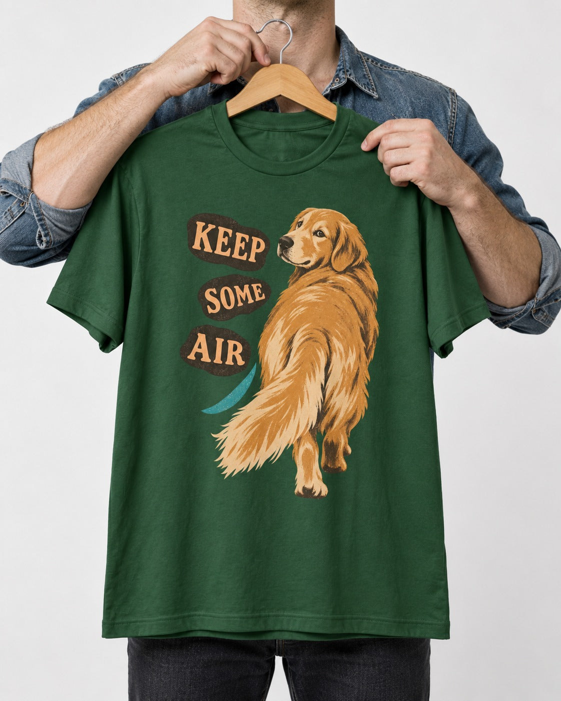 Golden Retriever Keep Some Air Looking Back Graphic T-Shirt in Forest Green, held up on a hanger