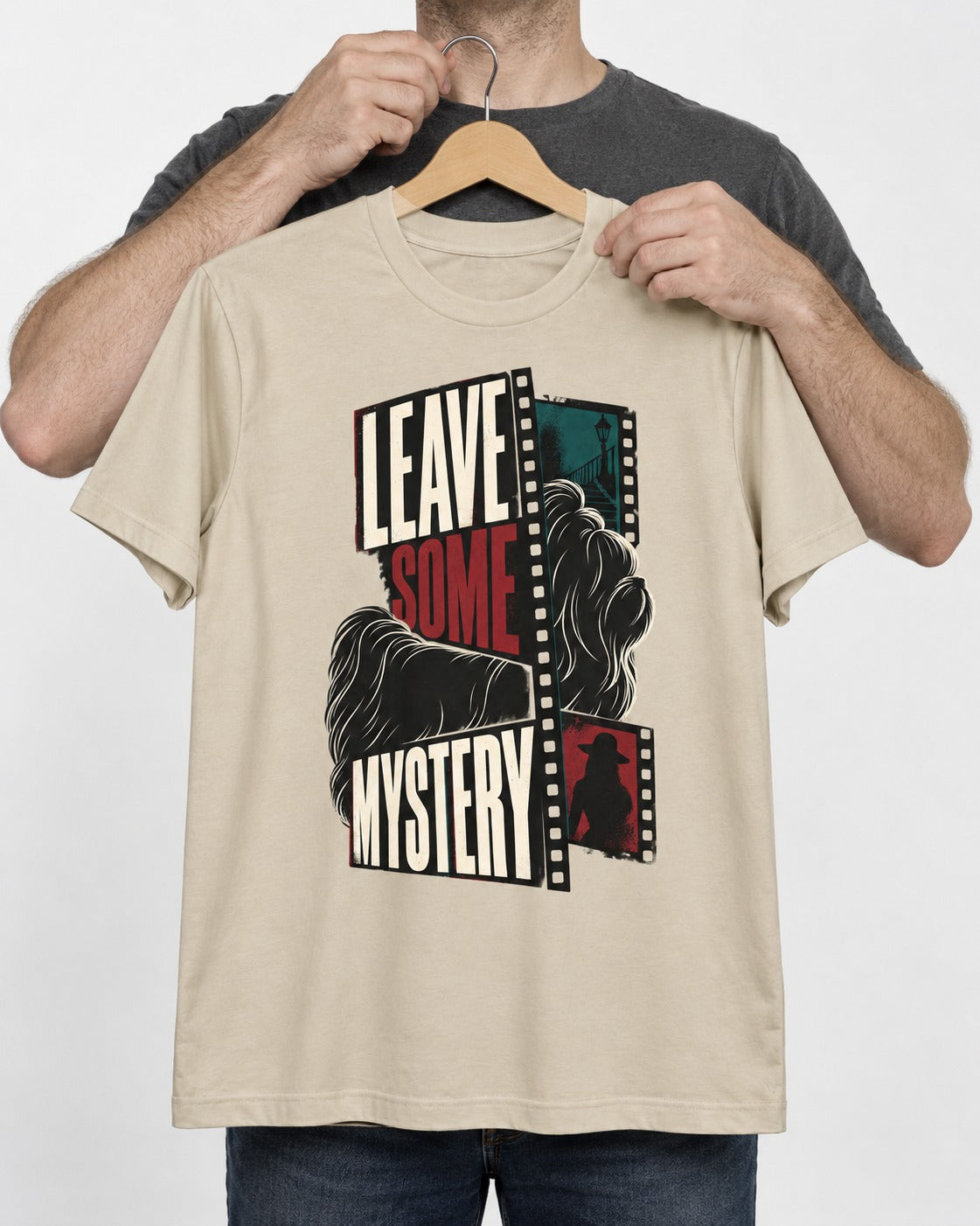 Leave Some Mystery Shih Tzu T-Shirt in Sand, held up on a hanger