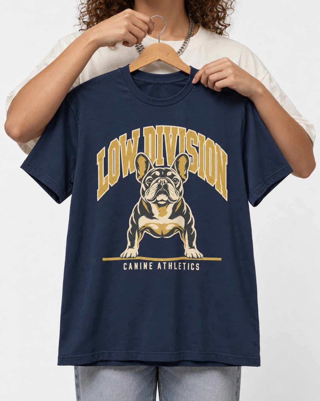 Frenchie Low Division Canine Athletics Graphic T-Shirt in Navy, held up on a hanger
