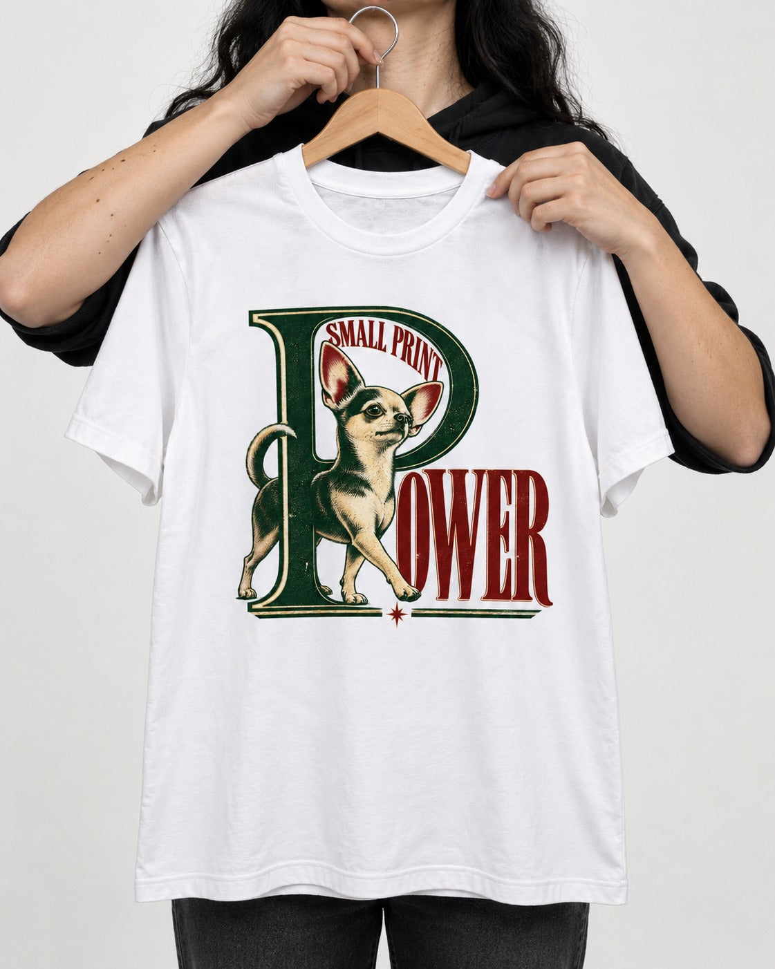 Chihuahua Small Print Power Monogram Graphic T-Shirt in White, held up on a hanger