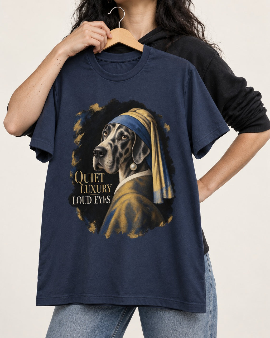 Great Dane Quiet Luxury Loud Eyes Pearl Portrait Graphic T-Shirt in Navy, held up on a hanger
